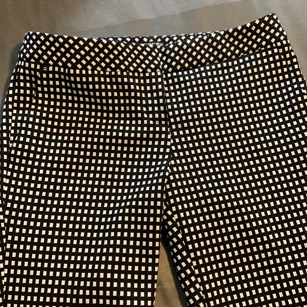 Express white and black checkered dress pant side pockets . Columnist